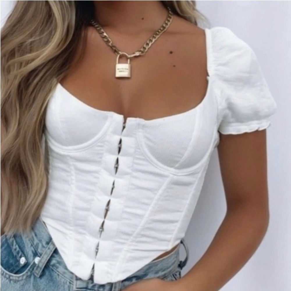 White Fox Boutique white puff sleeve corset top.